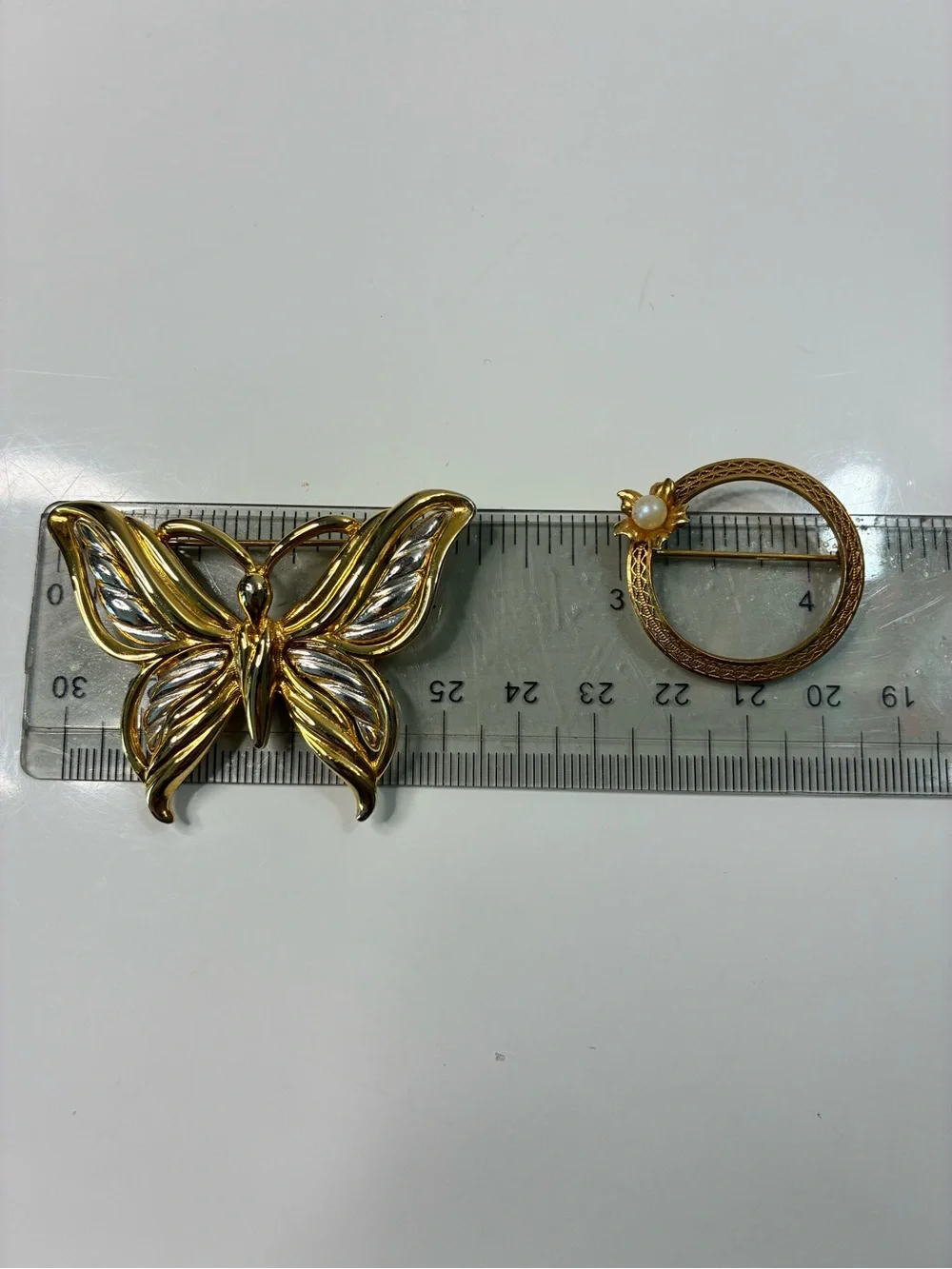 Two-Tone Gold and Silver Butterfly Brooch and Classic Infinity Floral Pin